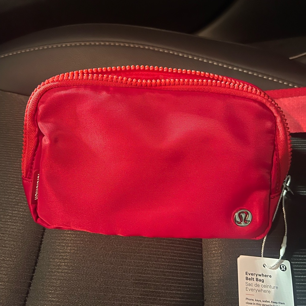 Red lululemon crossbody bag. NWT.